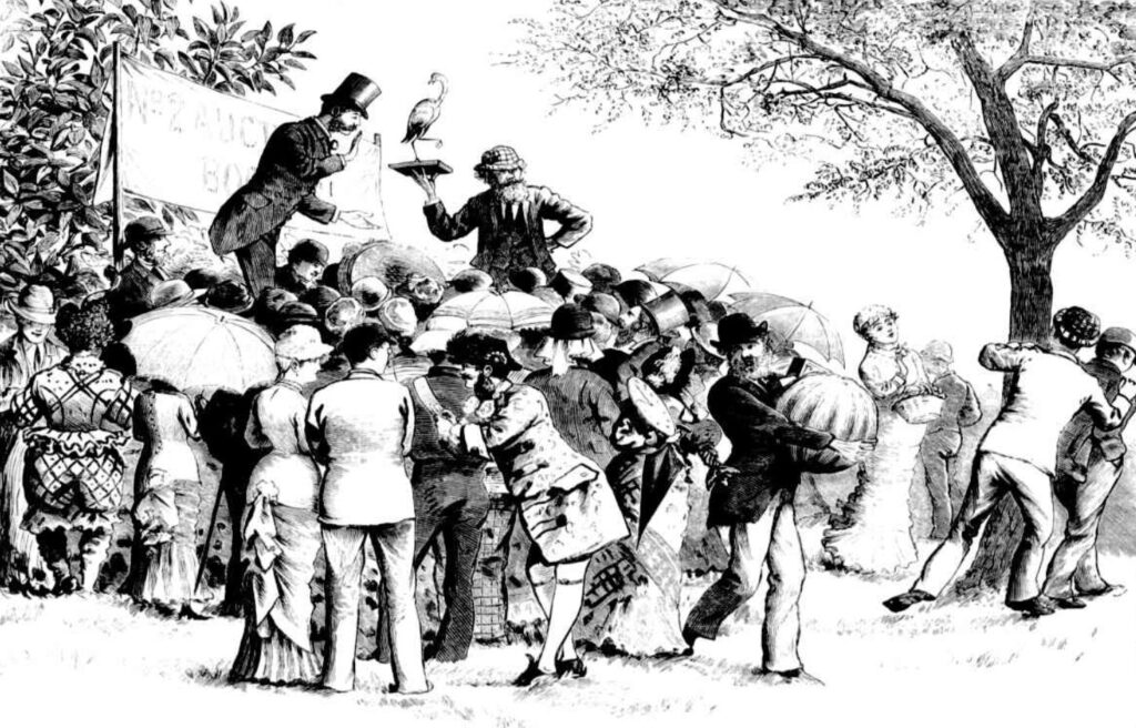 A black and white illustration of an open-air auction. An auctioneer stands on a platform over a crowd, while a clerk holds up a small statue of a bird.