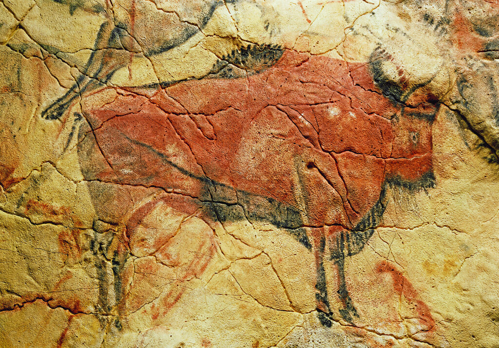 A paleolithic cave painting of a red bull. The aatxe is possibly inspired by these paintings.
